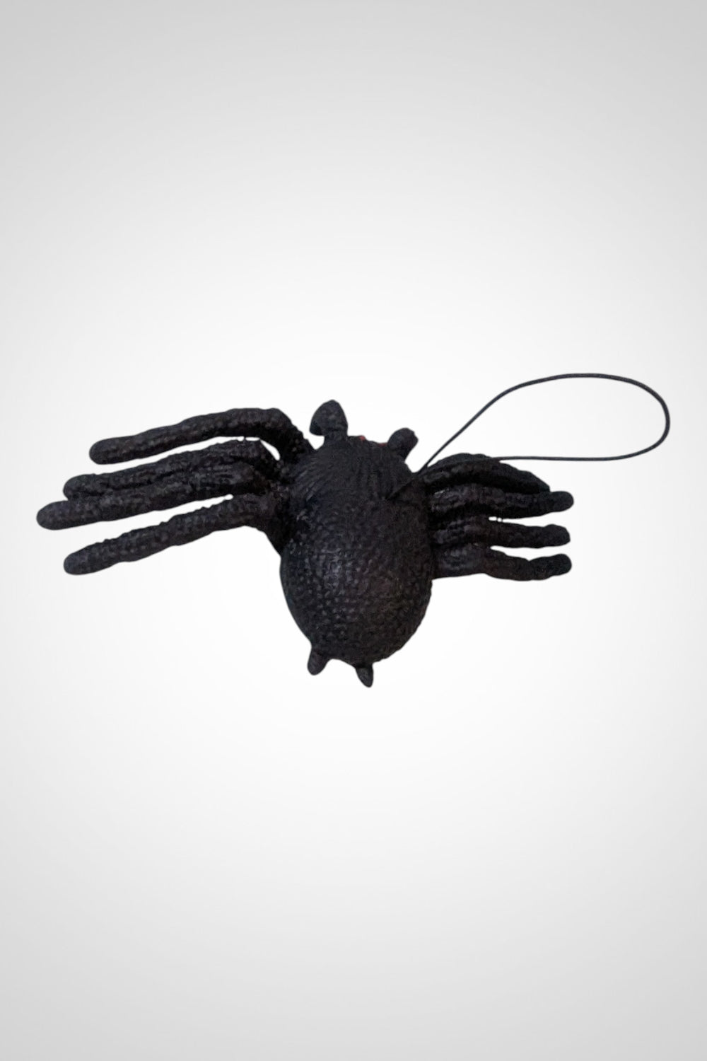 Araignée noire plastique élastique yeux rouges décoration