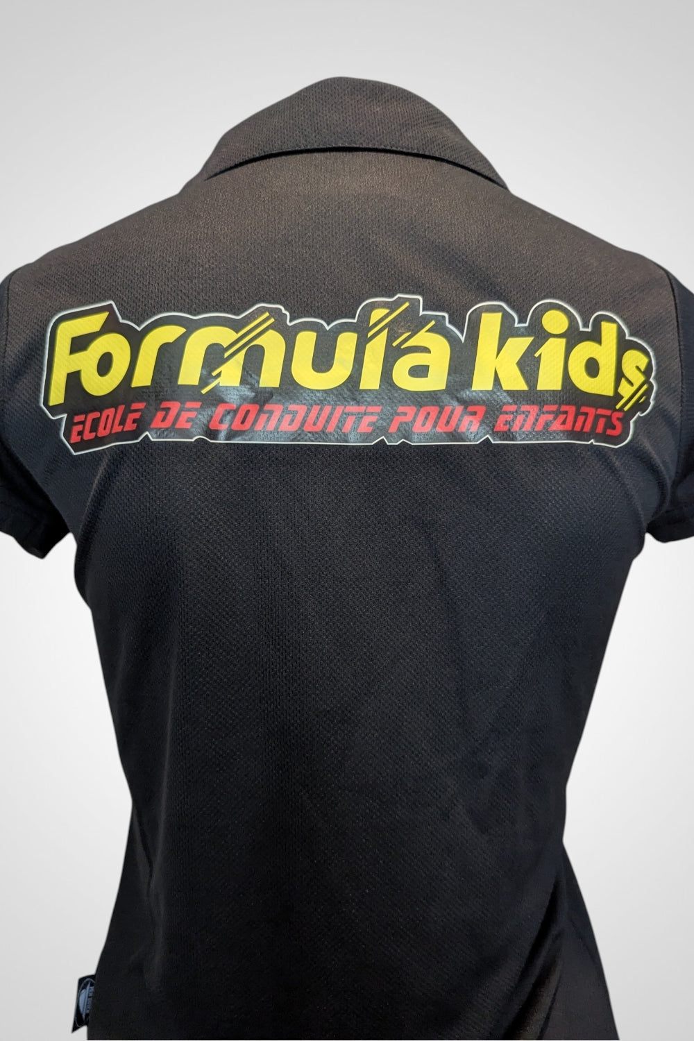 Polo femme Pen Duick noir Formula Kids école de conduite M