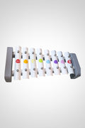 Xylophone Janod blanc et multicolore en bois bon état