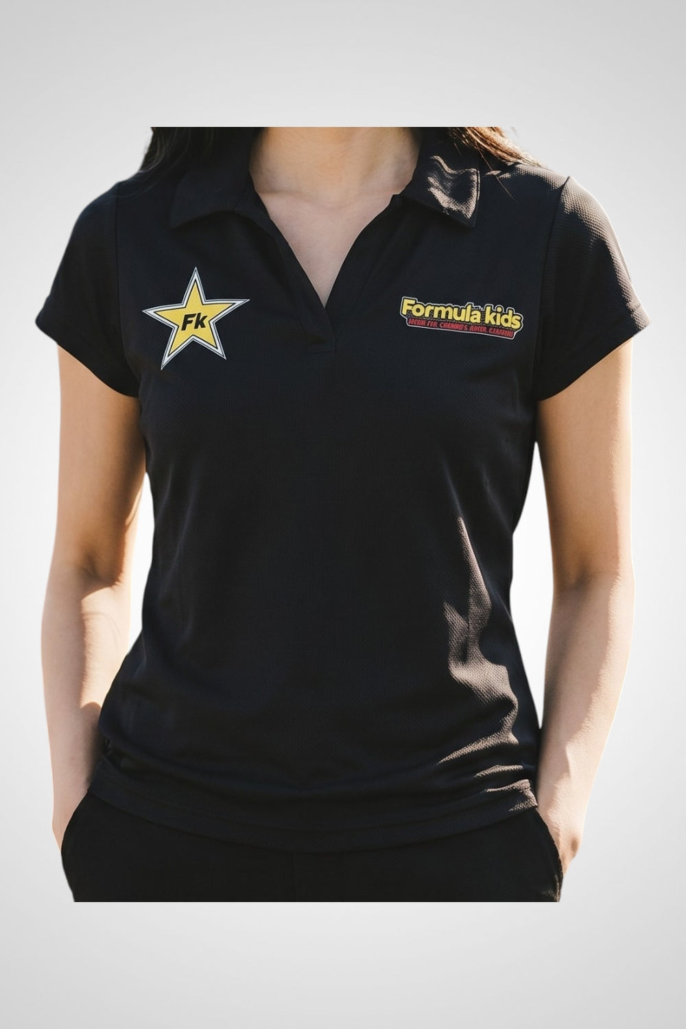 Polo femme Pen Duick noir Formula Kids école de conduite M
