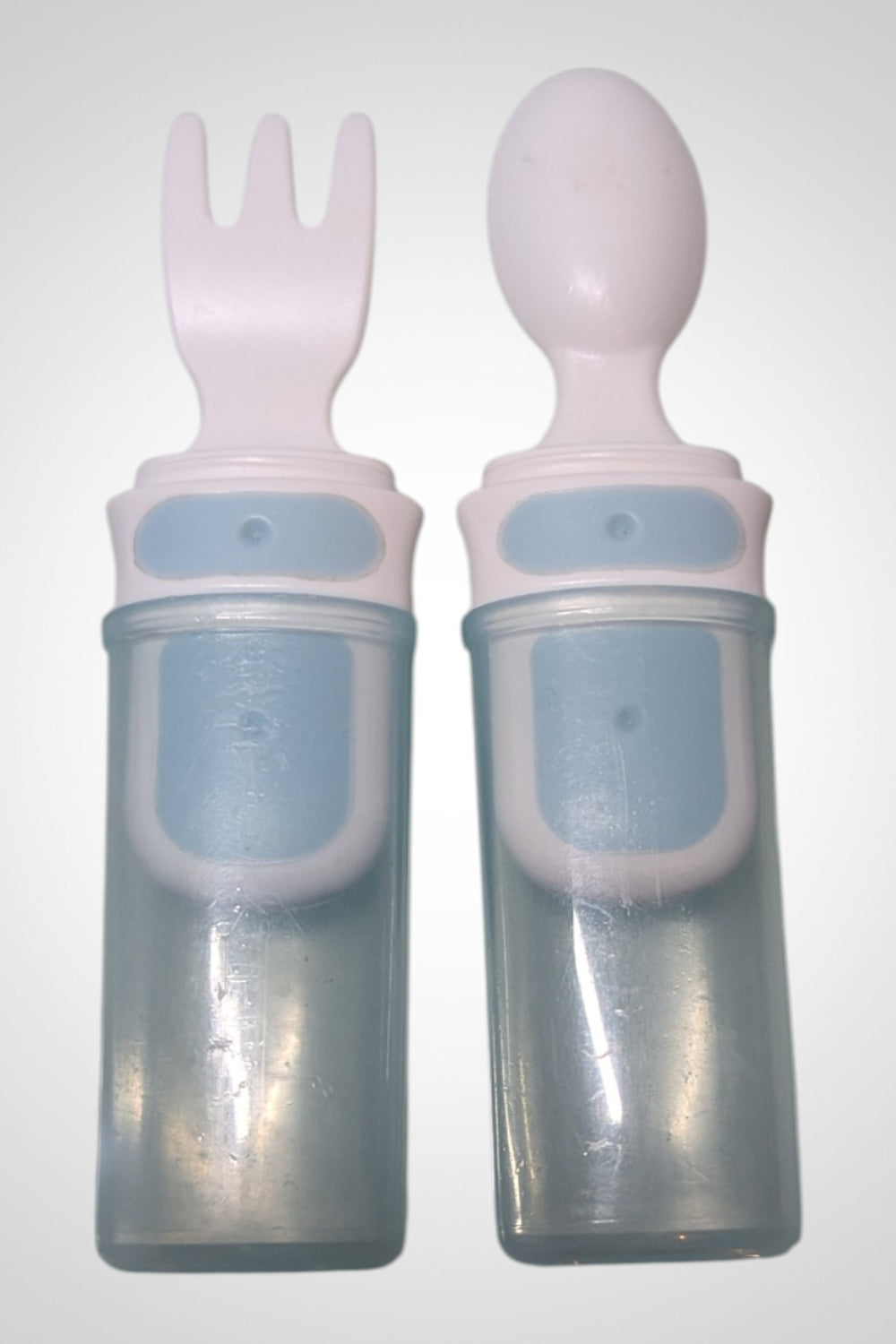 Cuillère et fourchette bébé blanches et bleu clair plastique très bon état