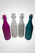 Lot de 4 bouteilles en verre décoratives bon état