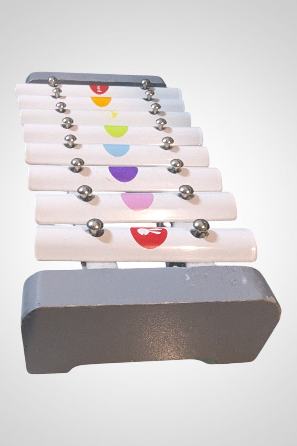 Xylophone Janod blanc et multicolore en bois bon état