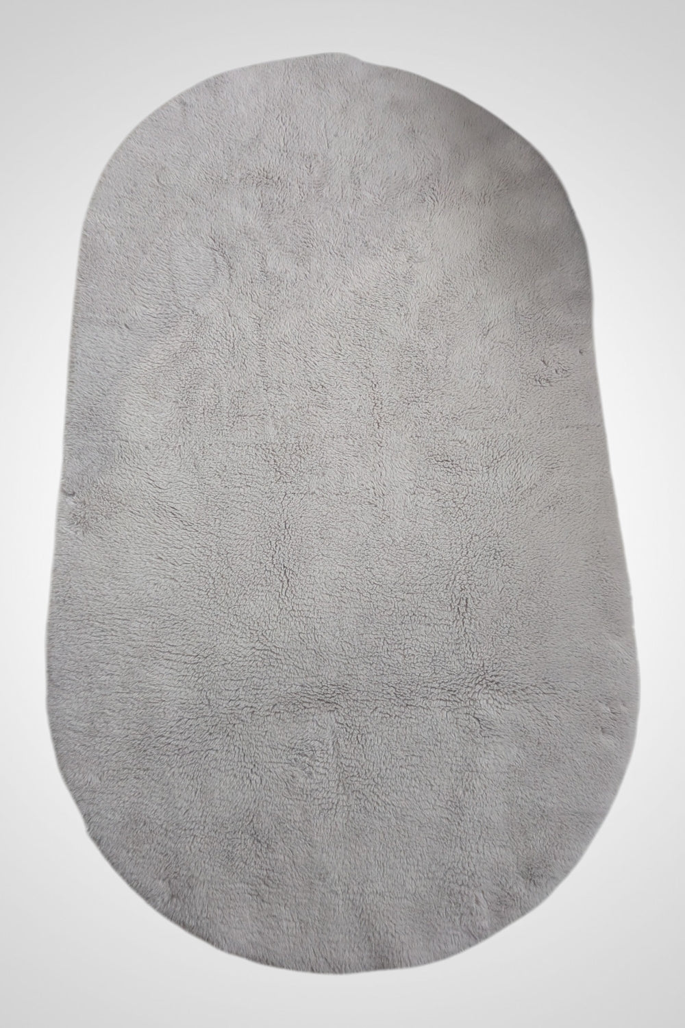 Grand tapis ovale beige fausse fourrure 155 x 90 cm très bon état